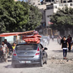 Palestinians flee their homes during the Israeli air and artillery strikes as cross-border violence between the Israeli military and Palestinian militants continues in the northern Gaza Strip.